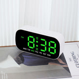 Electronic alarm clock with LED digital display